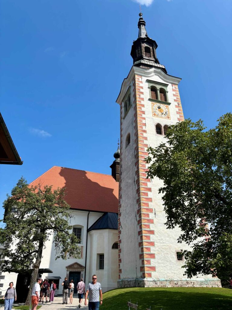 lake bled with kids_bled island church_the knowledge nuggets